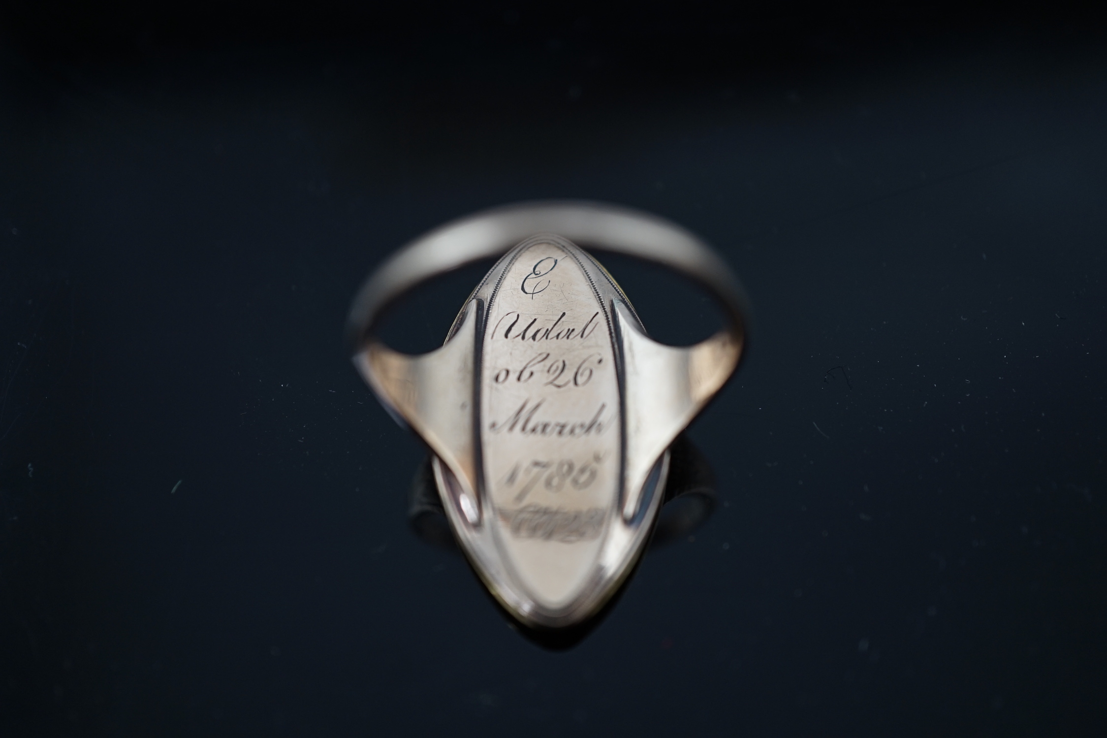 A George III gold and two colour enamel set navette shaped mourning ring, CITES Submission reference MFD9LPN4